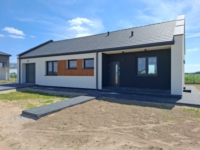 Sprzedam nowy dom z pompą ciepła i fotowoltaiką – Wola Podłężna, gm. Kramsk – tylko 6 km od Konina!
