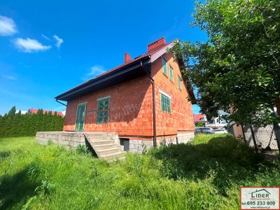 Solidny dom 163 m² | Stan otwarty, całe podpiwniczenie | Konin – Chorzeń